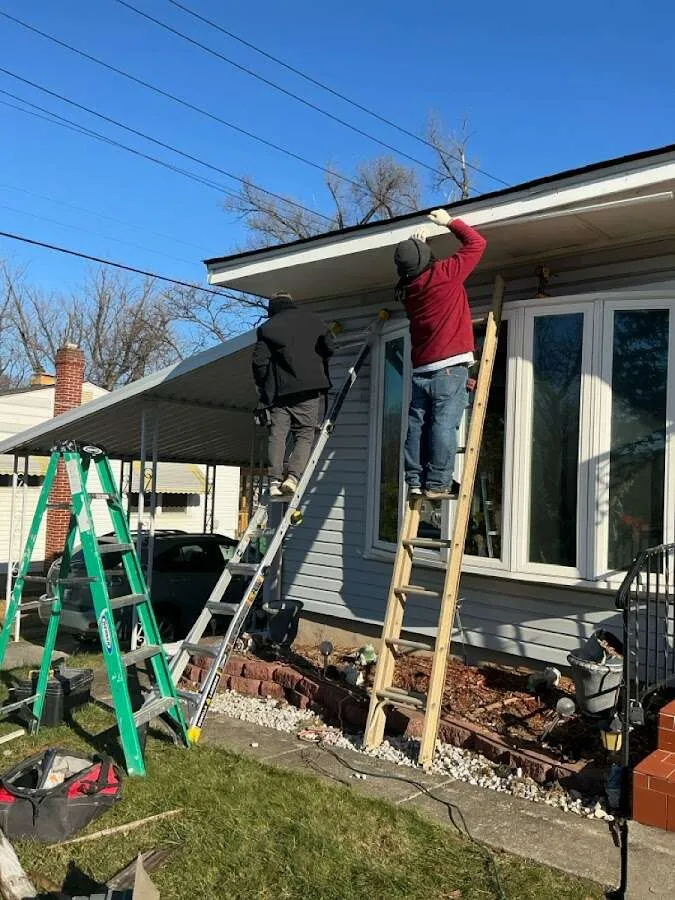 Restoration crew performing exterior repair in Canton